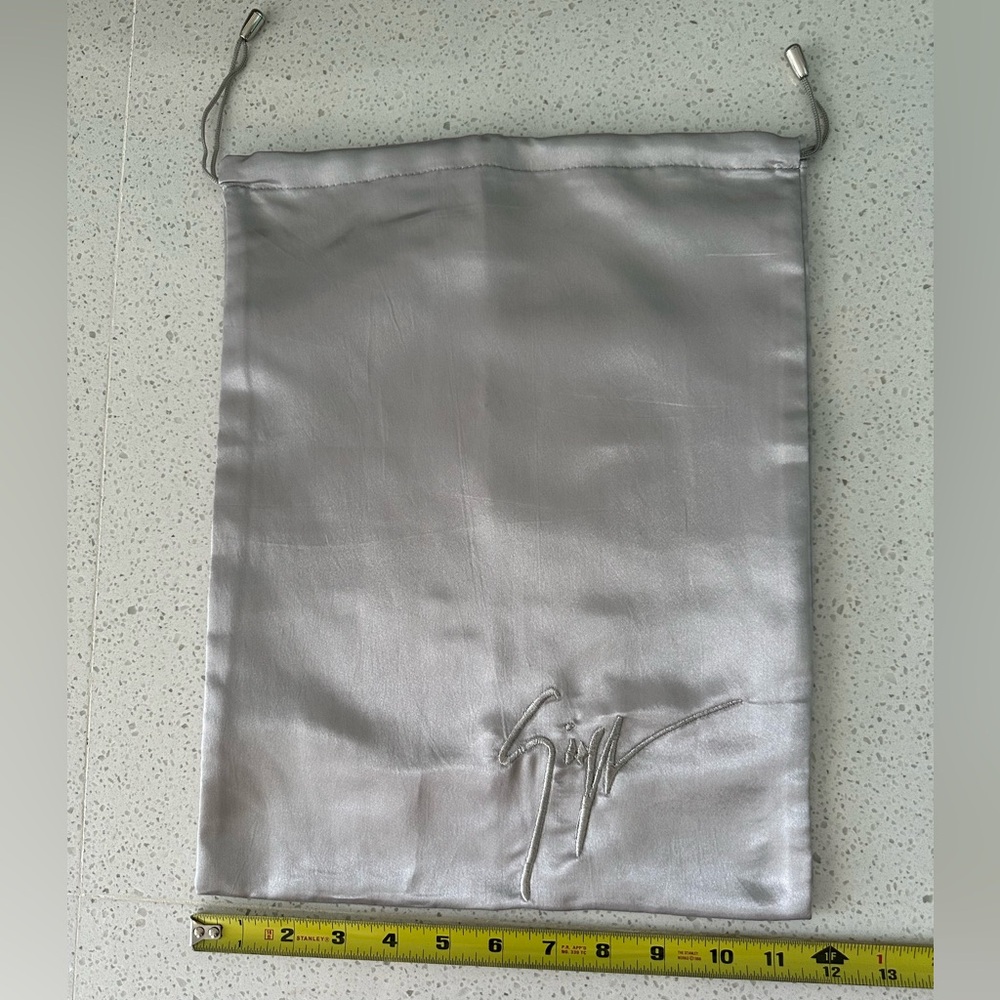 Giuseppe Zanotti Silver Dust Bag with Drawstring Closure